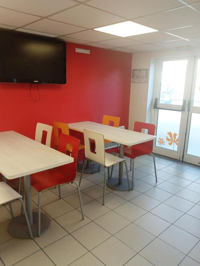 Premiere Classe Saint Brice Sous Foret Esterno foto